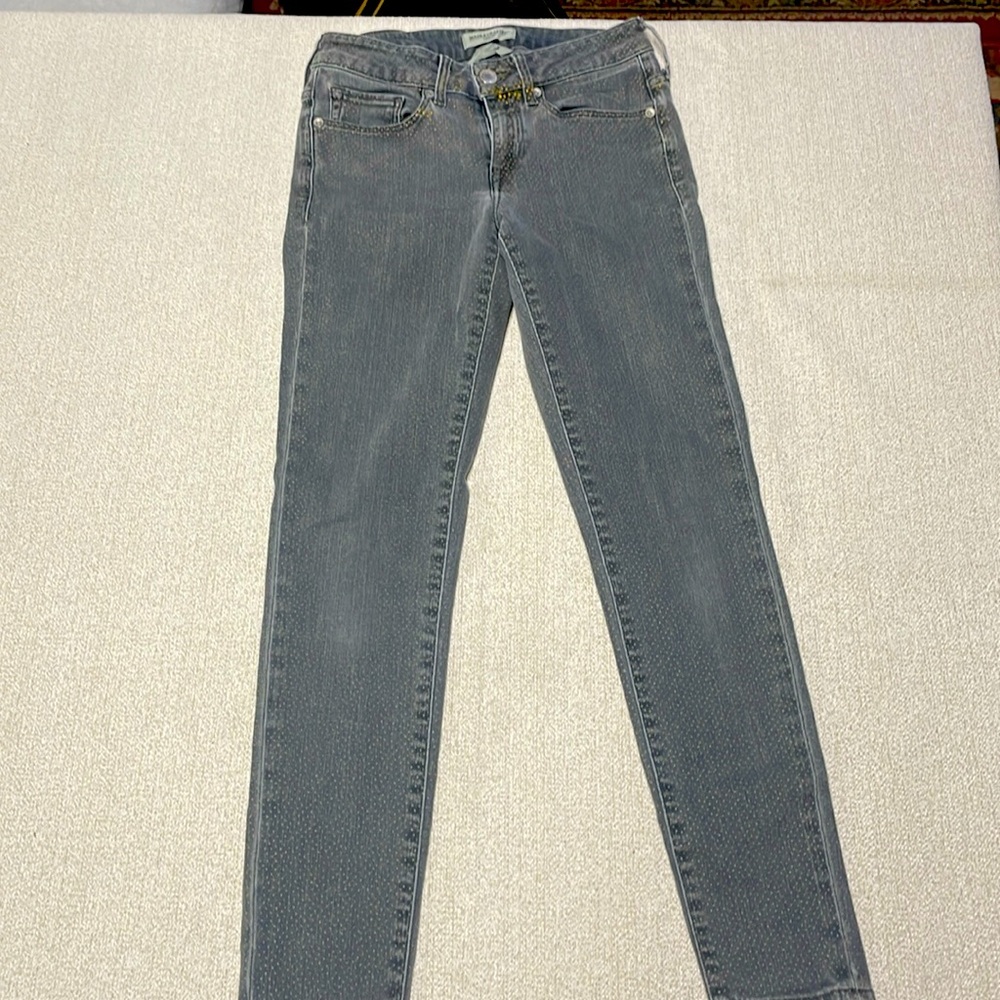 Levi’s slim grey jeans uniquely crafted with gold dots. Size 26